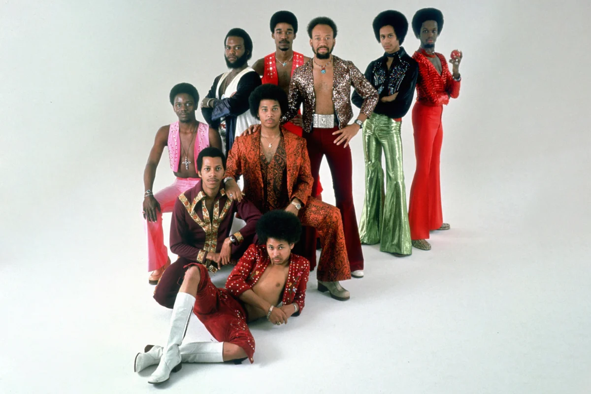 R & B group Earth Wind & Fire pose for a studio portrait circa the mid 1970s.